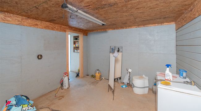 Another storage room in stable on concrete floor | Image 13