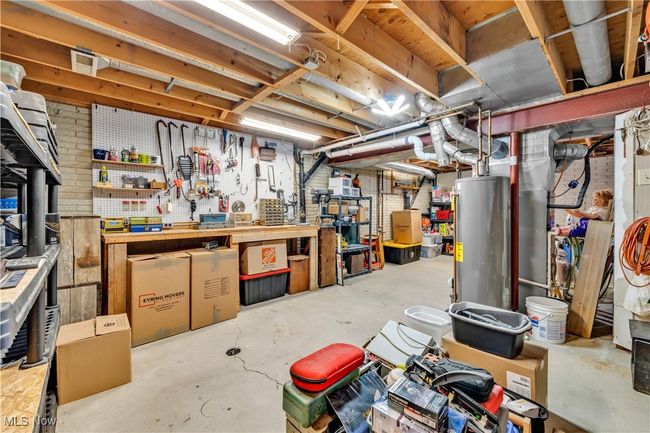 GREAT WORKSHOP OR HOBBY AREA - TONS OF STORAGE | Image 31