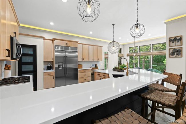 Large quartz countertops perfect for food prep. | Image 11