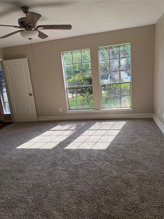 view from primary bathroom to bedroom | Image 8