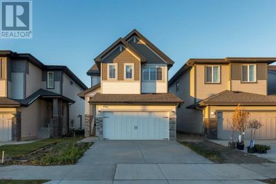 312 Heartland Way, House other with 3 bedrooms, 3 bathrooms and 4 parking in Cochrane AB | Image 1