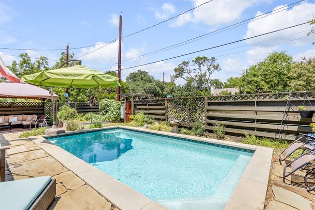 View of pool with a patio, a gazebo, and outdoor lounge area | Image 37