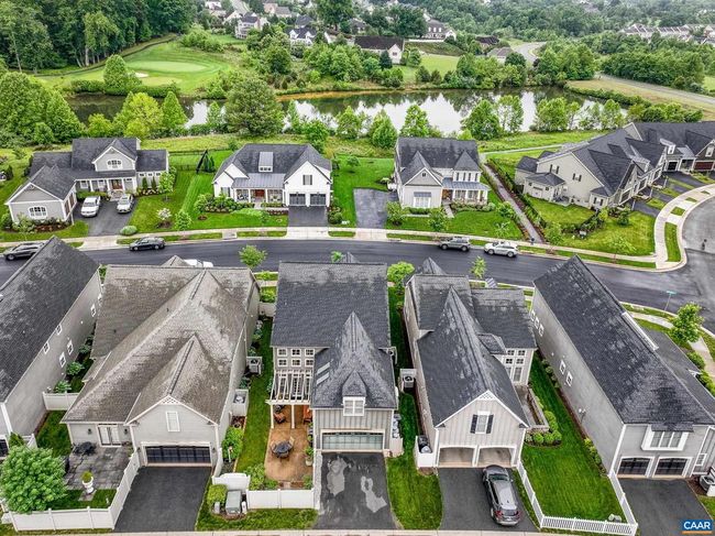 Walk to the golf course and enjoy mountain views from your front porch. | Image 57