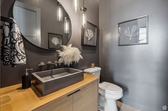 Half bath featuring toilet and vanity | Image 32