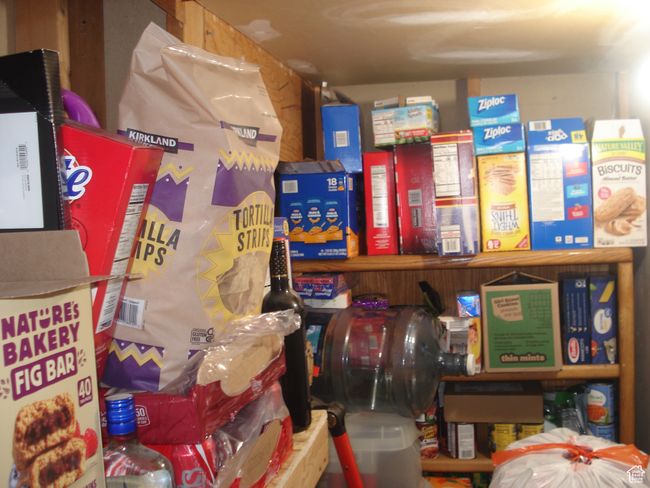 View of storage area and pantry | Image 19