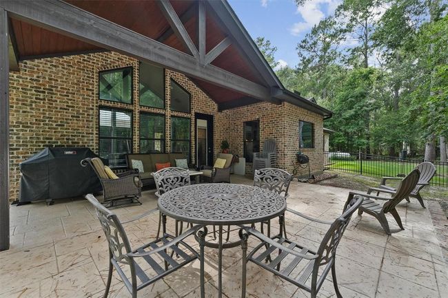 Extended stamped concrete patio on back porch | Image 28