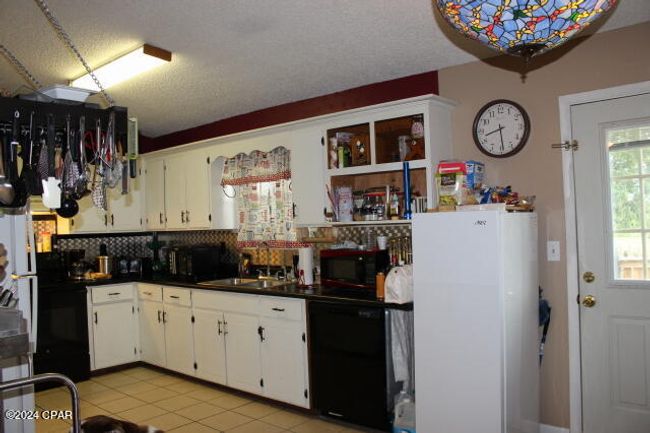 25676 Ne Evans St, House other with 3 bedrooms, 2 bathrooms and null parking in Altha FL | Image 22