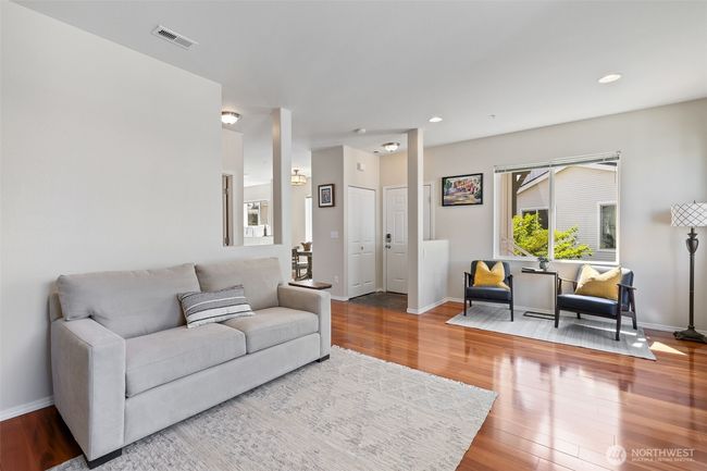 View #4 of Living Room showing entry and a peekaboo view of the dining room | Image 10