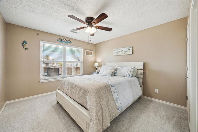 Spacious first-floor bedroom with a walk-in closet. | Image 18