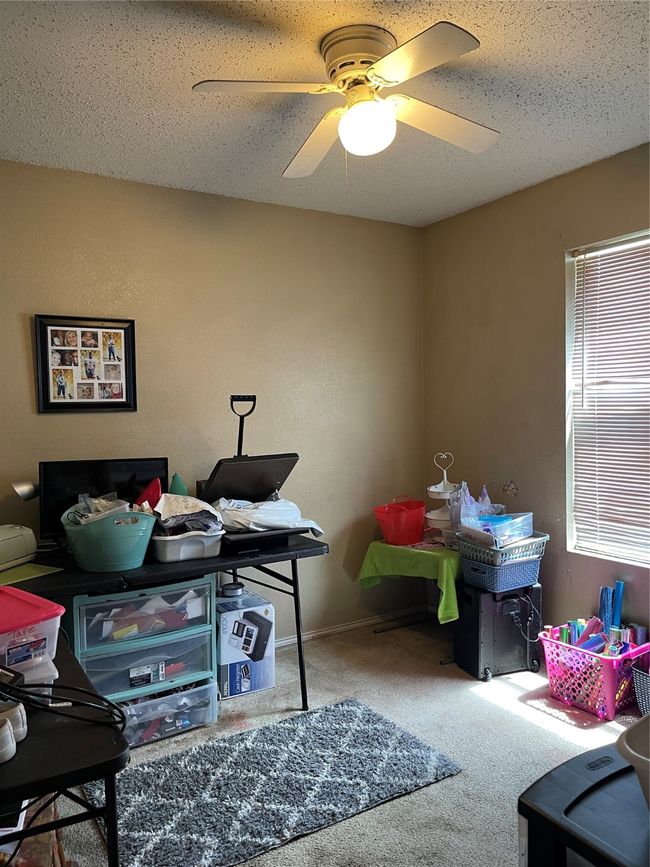 Bedroom with a ceiling fan | Image 11
