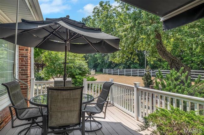 Wooden terrace with outdoor dining area | Image 41