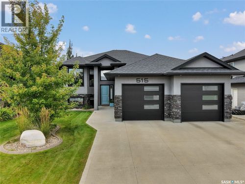 515 Couples Crt, House with 5 bedrooms, 3 bathrooms and null parking in Warman SK | Card Image