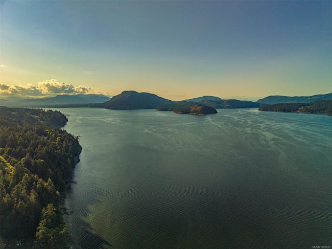 Water view featuring a mountainous background | Image 7