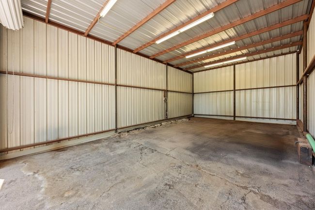 Interior of Large Industrial Metal Outbuilding. Lighted interior. | Image 35