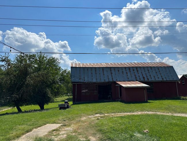 Nice views & extra paved parking behind barn | Image 37