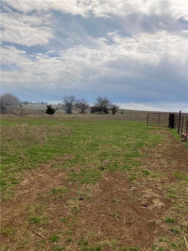 View of yard with fence and a rural view | Image 10