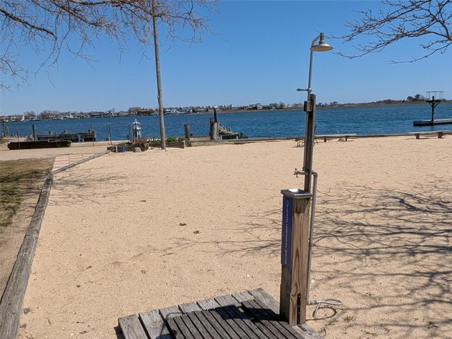 Water view with a boat dock | Image 8