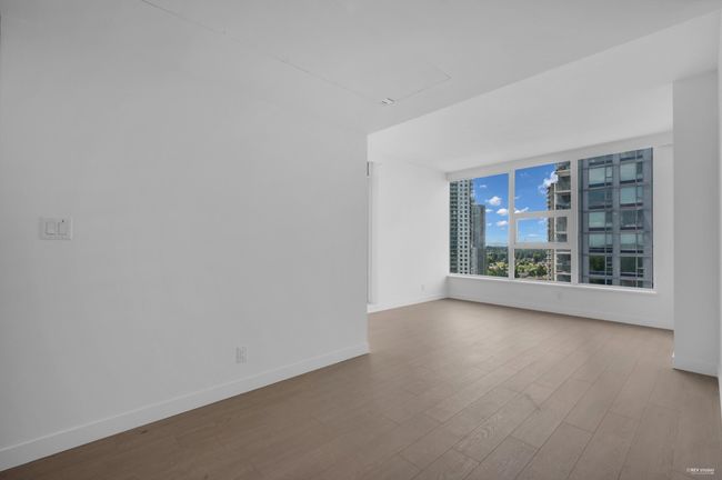 Unfurnished room featuring wood finished floors and baseboards | Image 6