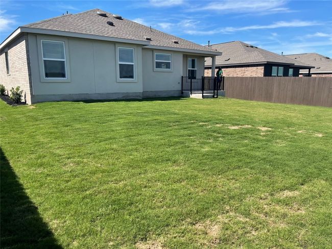 Rear view of house from the backyard | Image 20