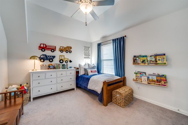 Upstairs third bedroom boasts taller ceilings, large window and walk in closet. | Image 28