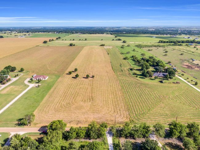 Aerial view of property's location with large plots for crops and rural landscape | Image 13