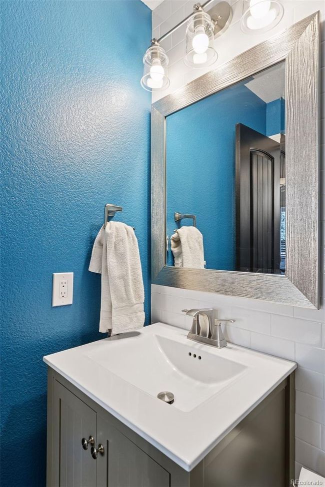 conveniently located powder room directly off the living room | Image 16