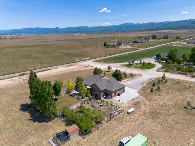 Aerial view of sparsely populated area with mountains | Image 55