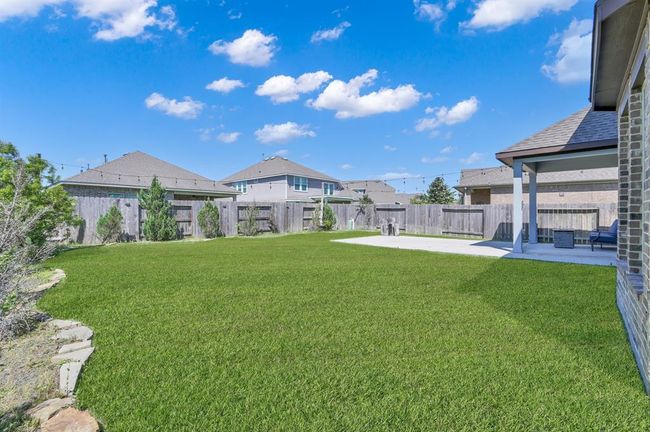 You have a HUGE amount of space for a pool or whatever your heart desires in your backyard entertainment area. | Image 32