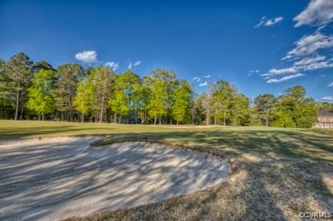 View of home's community featuring a lawn | Image 35