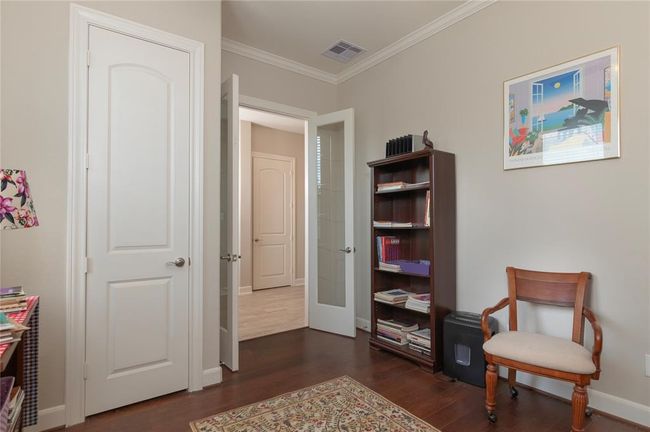 Home office is located just off the primary bedroom and half bathroom. This space could serve multiple purposes. | Image 25