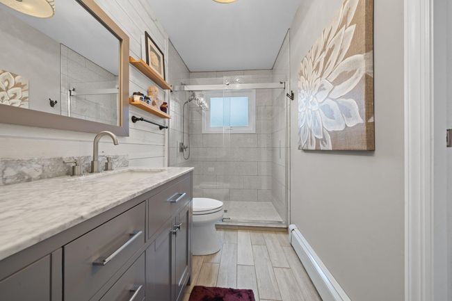 Bedroom featuring ornamental molding, wood finished floors, recessed lighting, and ceiling fan | Image 27