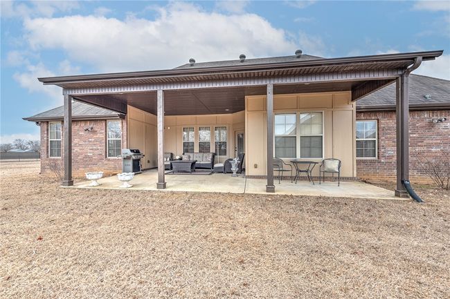 perfect covered patio for entertaining, grill connected to natural gas | Image 37