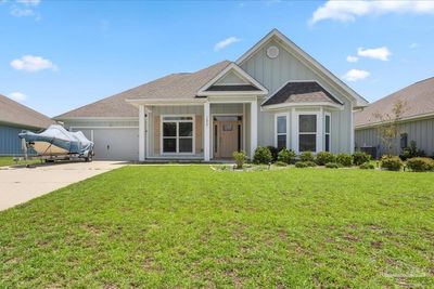 1452 Ballyhoo Dr, House other with 5 bedrooms, 3 bathrooms and 2 parking in Gulf Breeze FL | Image 1