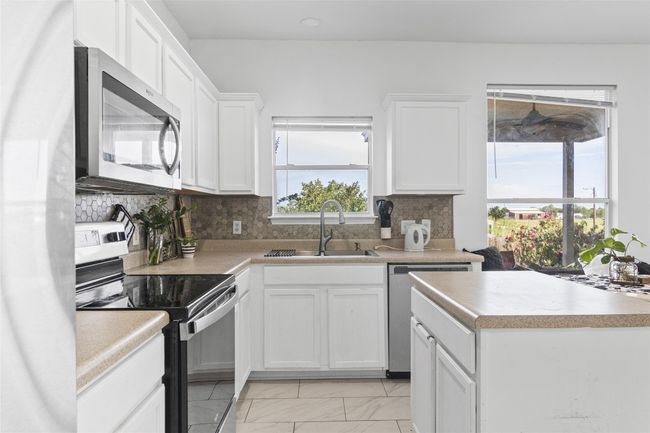 13524 Lyndon B Johnson St, House other with 3 bedrooms, 3 bathrooms and 2 parking in Manor TX | Image 14
