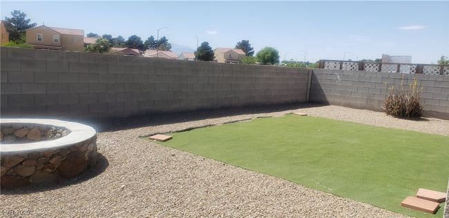 View of yard with fence | Image 10