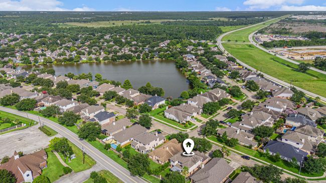 Ariel view of home location adjacent Kirby Lake. | Image 42