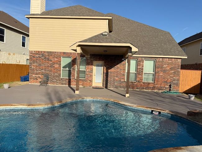 View of beautiful siwmming pool with great space to enjoy all year. | Image 29