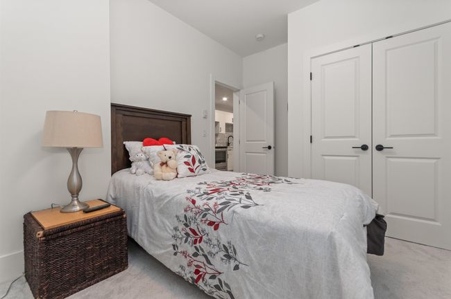 Bedroom featuring carpet floors and a closet | Image 32