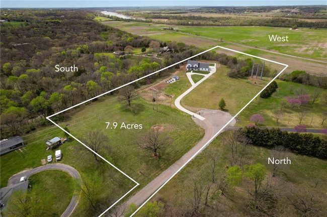 Aerial view of sparsely populated area featuring property boundaries highlighted | Image 64