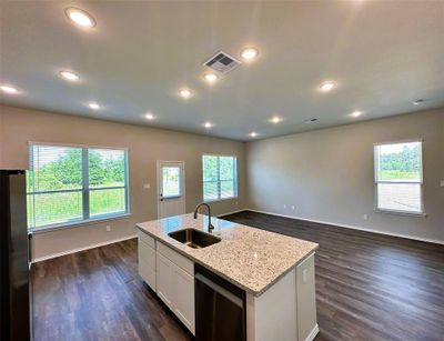 Open concept at is best- view from kitchen overlooking the dining & living room.(sample photo) | Image 3