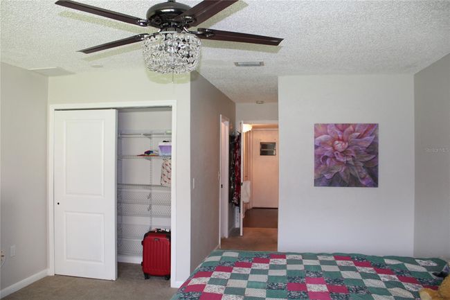 Second closet in primary bedroom (shoe closet) | Image 19
