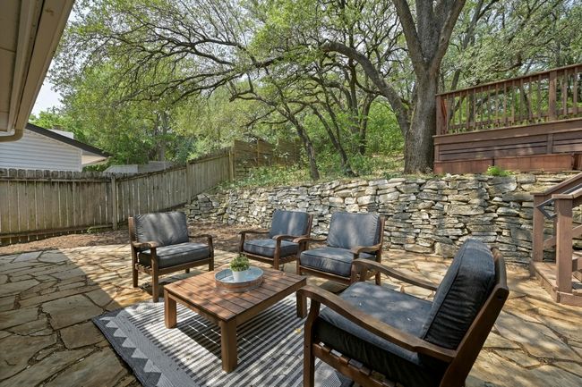 A level, paved area offers plenty of space to lounge or entertain. | Image 19