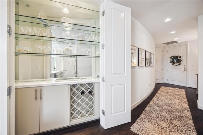 This shows the entryway and the bar area that can be closed off with folding doors. | Image 15