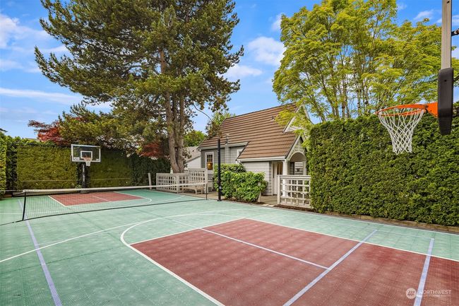Pickle ball, or shoot a few hoops? There is a private entrance to an additional dwelling space. It has 1 bedroom, full bath, kitchen, great room and balcony. It is permitted as part of the main house. | Image 35