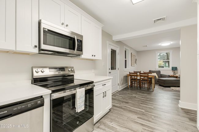 114 Nw 14 Th St, House other with 3 bedrooms, 2 bathrooms and null parking in Oak Island NC | Image 17