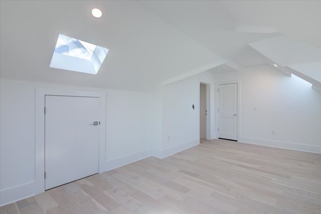 Or, this flex space can be locked off from the primary closet and used as a bedroom for guests or short term renters. Access to the garage/secondary flex space below with a full bathroom. SEE VIRTUAL TOUR LINK WITH INTERACTIVE FLOOR PLAN AND 3D WALK THRU. | Image 27