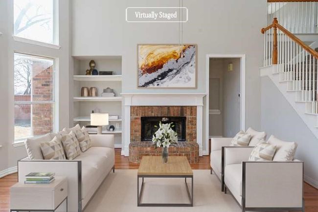 Living area featuring a wealth of natural light and wood finished floors | Image 4