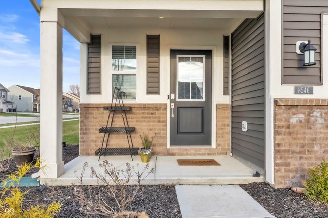 entrance to property featuring brick siding | Image 41