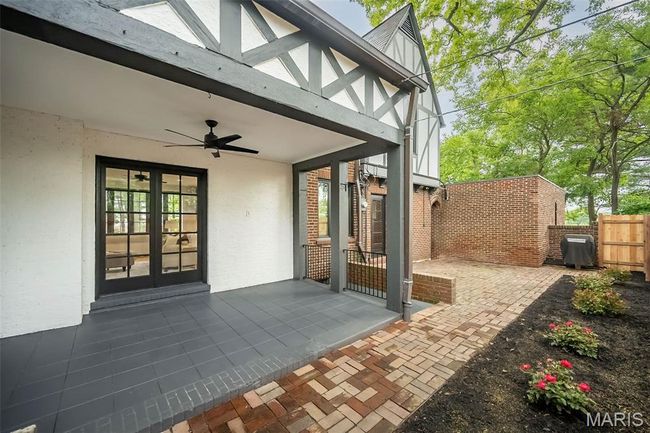 The rear brick patio is perfect for entertaining. | Image 29