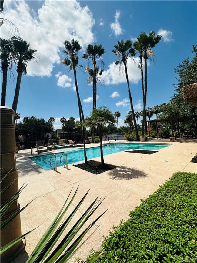 Community pool with a patio | Image 31